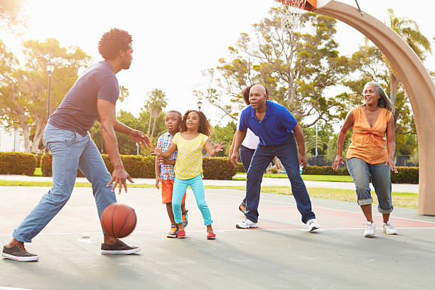 istock Multi Generation Family Playing Basketball Together 514274773