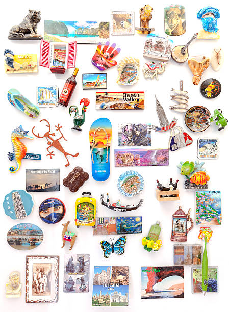 Souvenir magnets from all over the world on refrigerator. stock photo