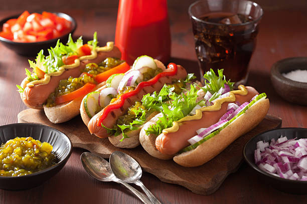 istock grilled hot dogs with vegetables ketchup mustard 514277324