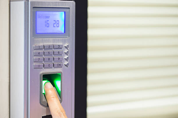 istock fingerprint and password lock in a office building 514278124