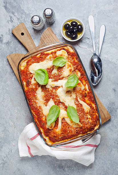 istock lasagna dinner with sauce bolognese sauce topped with basil leav 514279266