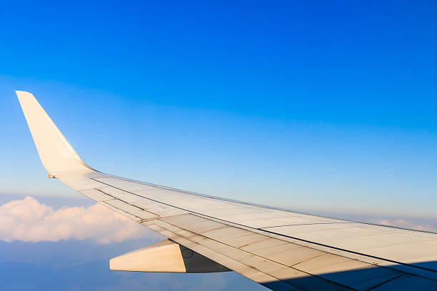 istock The wing aircraft in altitude during flight 514279918