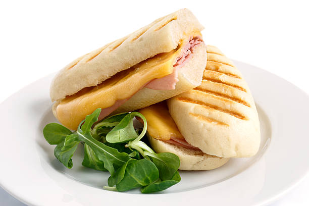 istock Cut cheese and ham toasted panini melt. 514280032