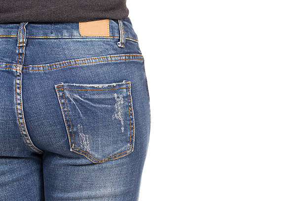 istock woman is wearing blue jeans, on white background 514280354