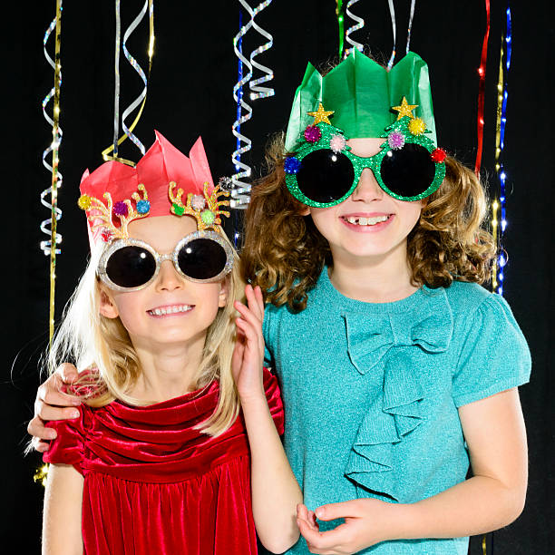 istock Young girls at a Christmas party 514294843