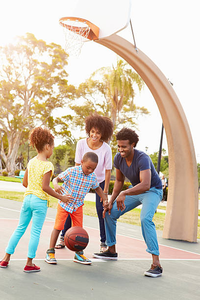 istock Family Playing Basketball Together 514295093