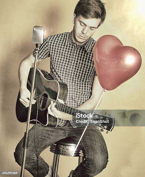 Guitarist With Balloon In The Shape Of Heart 50s Style Stock Photo - Download Image Now
