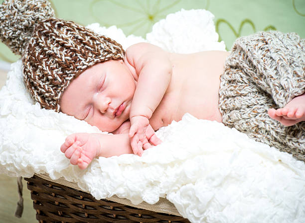 istock beautiful newborn baby boy sleeping 514297789