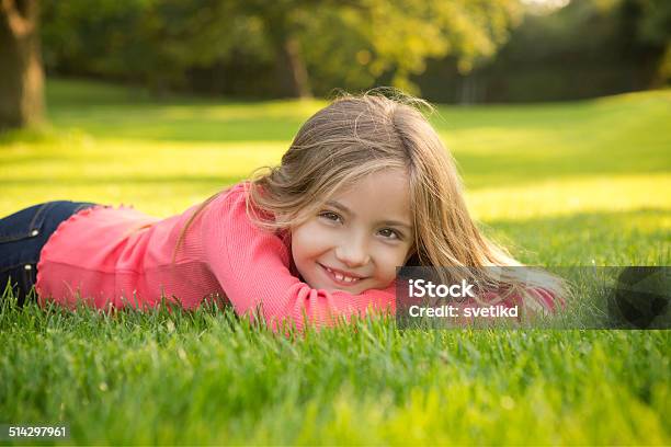 Cute Girl In A Park Stock Photo - Download Image Now - 8-9 Years, Adolescence, Autumn