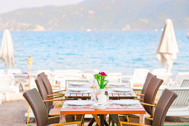 istock table cafe on the beach near the sea 514299413
