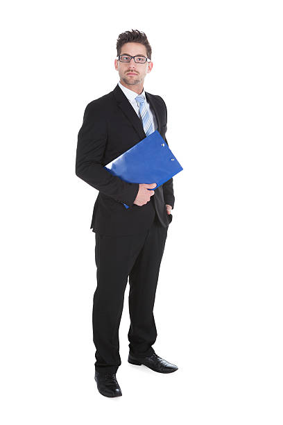 istock Confident Young Businessman Holding Clipboard 514300619