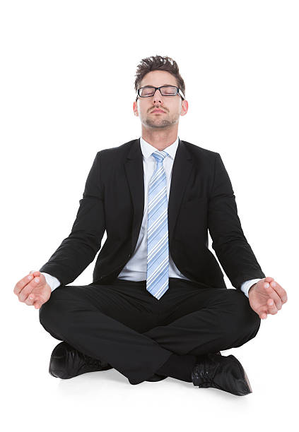 istock Businessman Meditating Over White Background 514301117