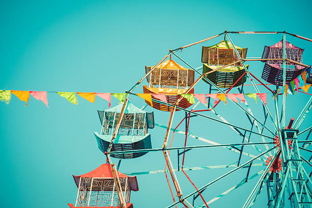 istock Ferris wheel on blue sky background vintage color 514311540