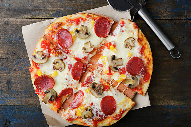 istock Sliced Pepperoni Pizza with cheese and mushrooms 514311782
