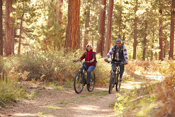 istock Senior Couple Cycling Through Fall Woodland 514312154