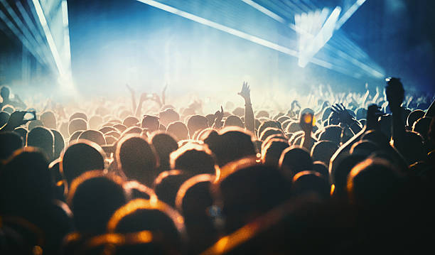 istock People at concert party. 514312210