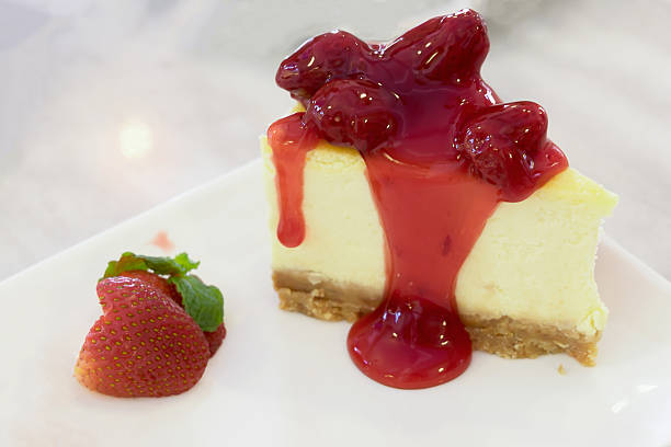 istock Strawberry cheesecake with red topping 514316292