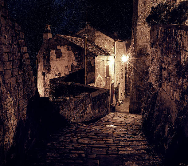 istock Sorano street at night 514316458