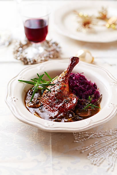 istock Christmas duck leg in red wine and mushroom sauce 514318295