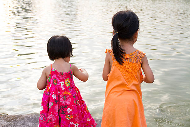 Kids having a good time on boat during summer vacation.