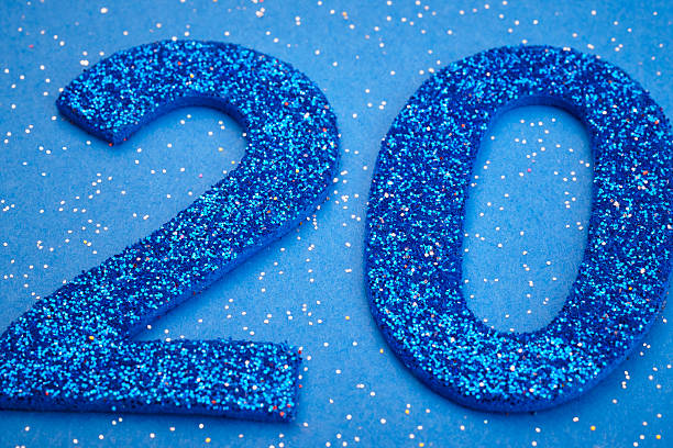 istock Number twenty blue color over a blue background. Anniversary 514318726