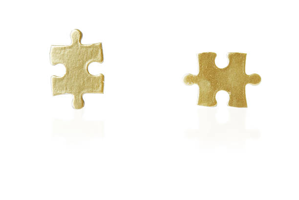 business ist wie ein puzzle - puzzle part of gold jigsaw piece stock-fotos und bilder