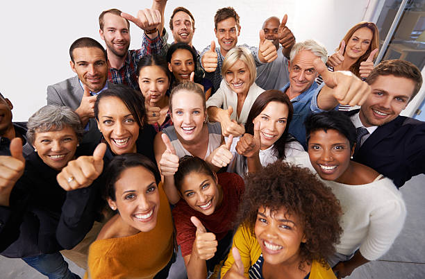 Diversity that makes the team work High angle shot of a diverse group of business professionals organised group photo stock pictures, royalty-free photos & images