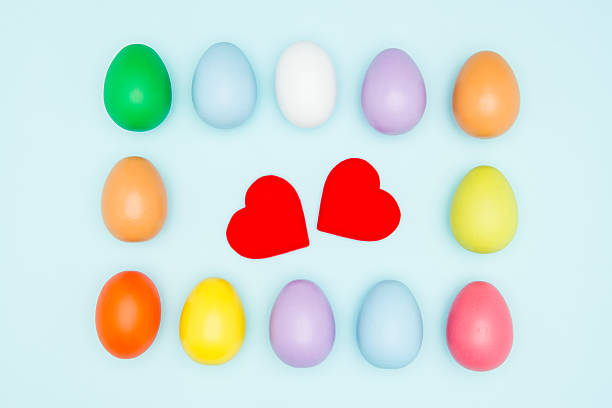 istock Colorful easter eggs around the hearts shape, valentines 514321942