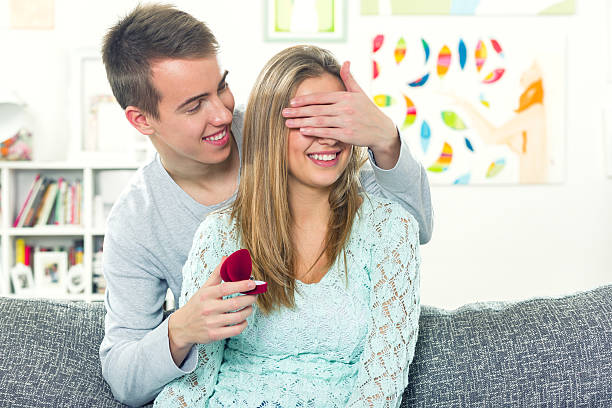 istock man gives a engagement  ring to his girlfriend. 514322138
