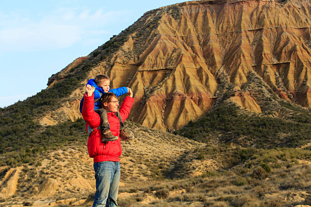 istock father and son travel in scenic mountains 514322682