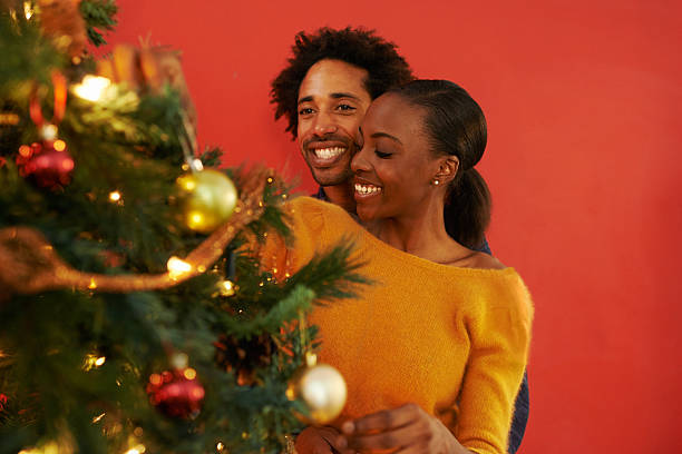 istock They love decorating the tree together 514325053