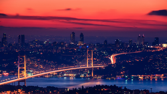 The Bosphorus Bridge in Istanbul at night, Turkey. The Bosphorus Bridge connecting Europe and Asia.