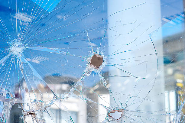 istock bullet holes in the window 514327514
