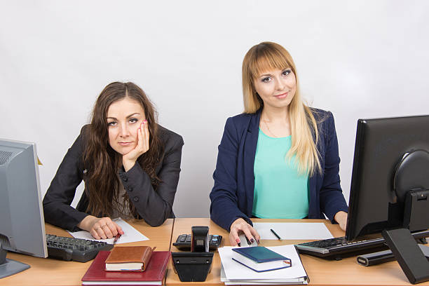 istock Two girls looking to frame a joy, and second upset 514327654