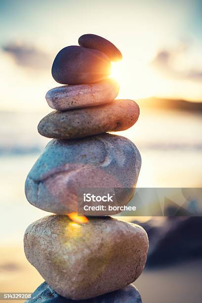 Sunset On The Beach Stock Photo - Download Image Now - Stone - Object, Stack, Zen-like