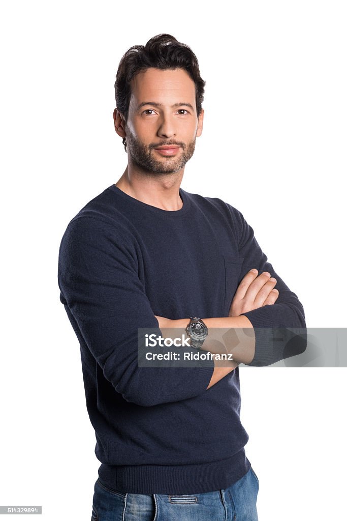 Proud young man Casual young man looking at camera with arms crossed and satisfaction. Happy proud man isolated on white background. Handsome smiling guy isolated over white background. Men Stock Photo