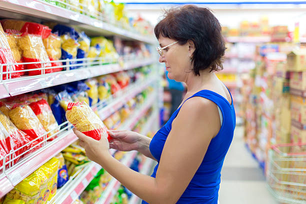istock woman buys pasta 514340151
