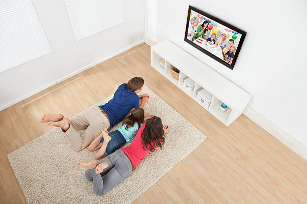 istock Family Watching TV At Home 514340279
