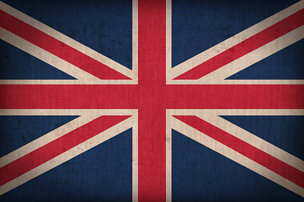 istock United Kingdom flag pattern on the fabric texture ,retro style 514341211