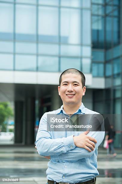 Smiling Asian Businessman Stock Photo - Download Image Now - Adult, Adults Only, Arms Crossed