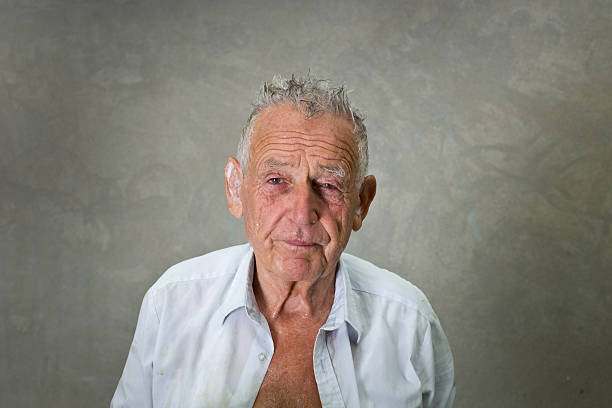 Old man with wet hair