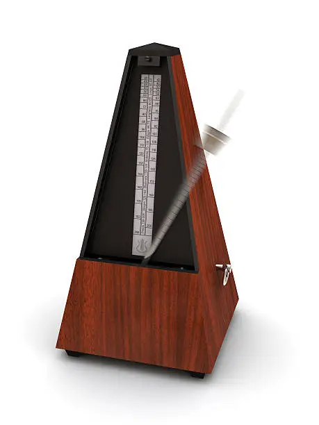 A musical metronome with motion-blurred moving pendulum on white background