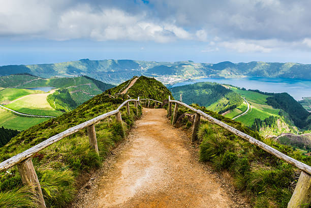 Walking path to the lakes of Sete Cidades, Azores, Portugal Walking path leading to a view on the lakes of Sete Cidades, Azores, Portugal sao miguel azores stock pictures, royalty-free photos & images