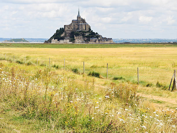 istock rural landscape with mont saint-michel abbey 514365361
