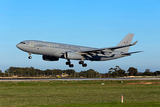 Royal Air Force Airbus refuelling tanker landing in the evening. Luqa, Malta - January 26, 2016: RAF Military Airbus landing. voyager stock pictures, royalty-free photos & images