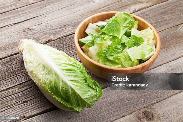 Fresh Healthy Romaine Lettuce Salad Stock Photo - Download Image Now - Romaine Lettuce, Wood - Material, Appetizer