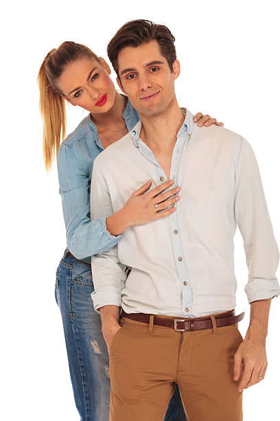 istock attractive couple posing in isolated studio 514369758
