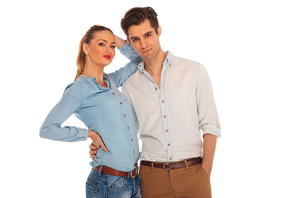 istock man with hand in pocket holding girlfriend 514371306