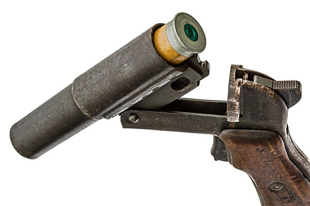istock Cartridge is inserted into the barrel  flare gun, isolated 514372020