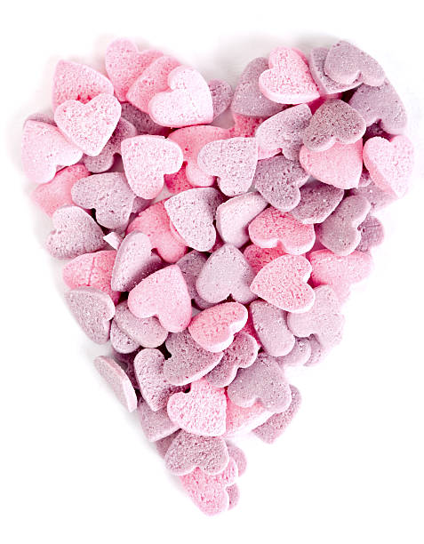 istock Purple and pink candy hearts shaped in a heart 514372230